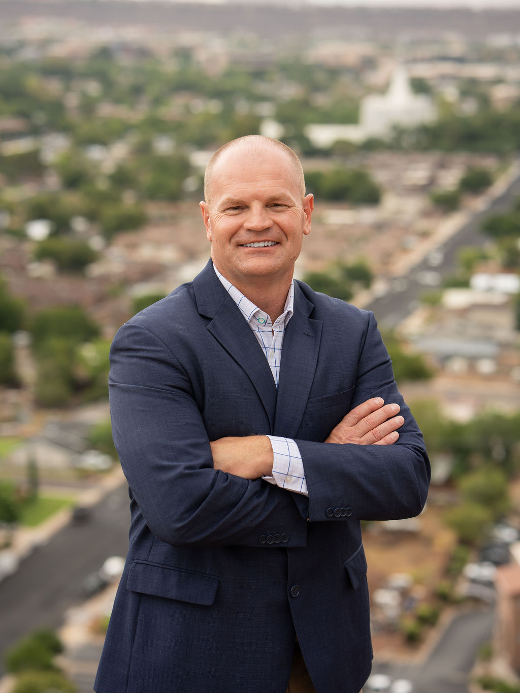 Brandon Olson, CPA, standing above the St. George valley